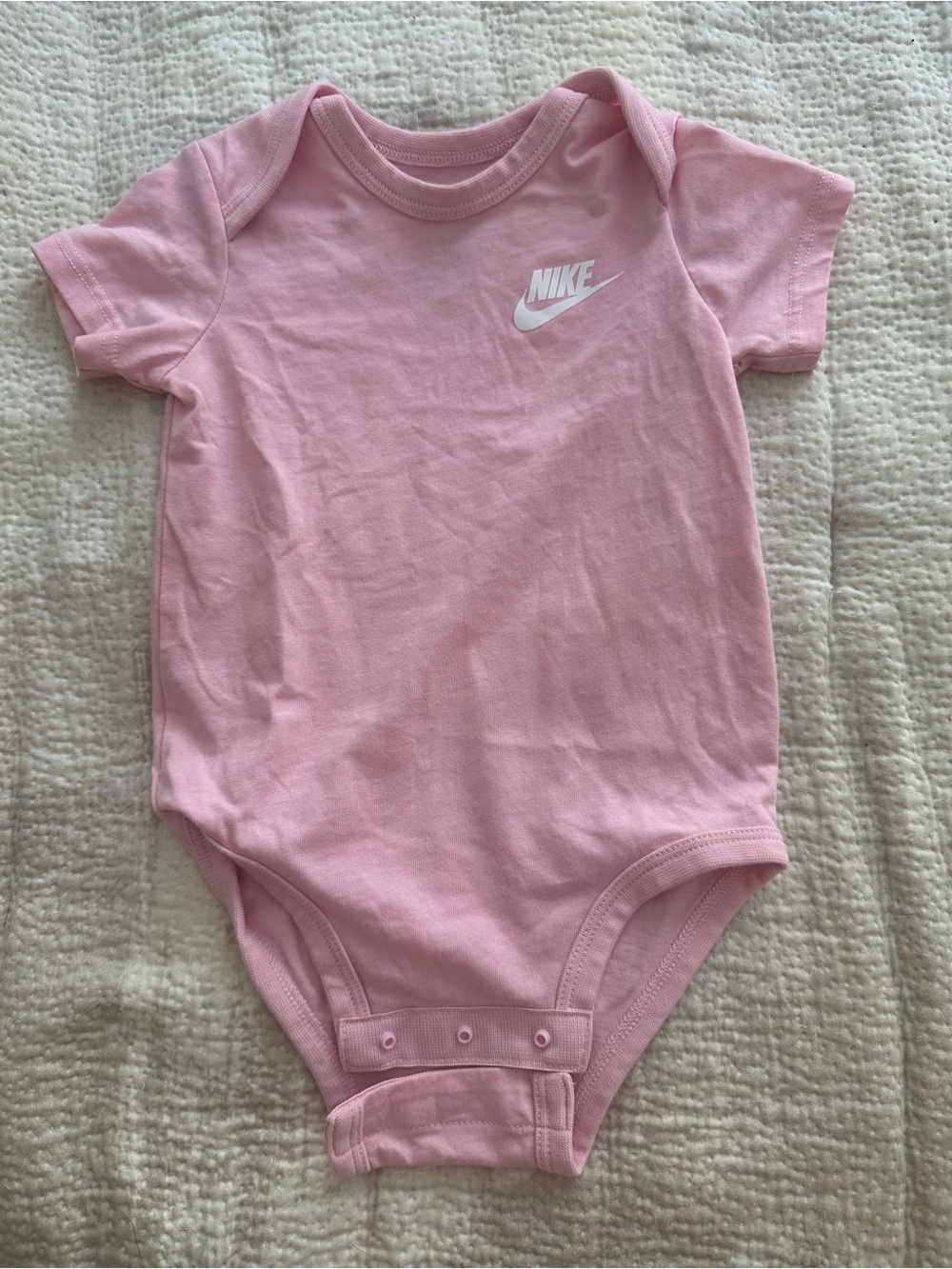 |Nike| Pink Infant One-Piece Bodysuit with White Logo